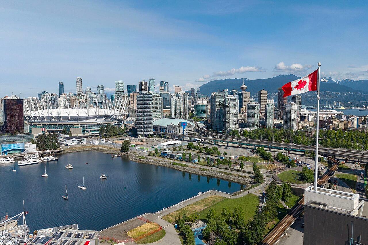 Vancouver city skyline and marina viewed from Granville Island on a sunny day