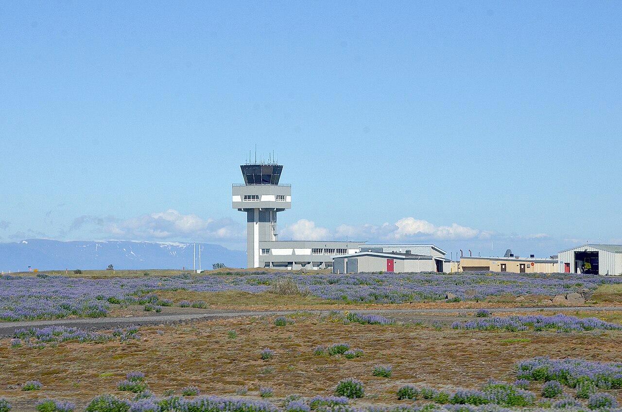 Keflavík Airport departures hall with gate D15-16 and A and C signs overhead