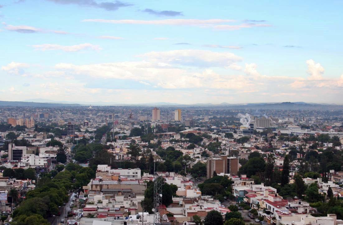 Guadalajara city skyline with HSBC tower and mountains in background