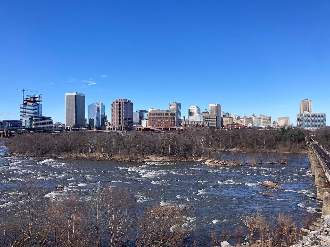 Richmond Virginia city skyline with green parkway and blue sky