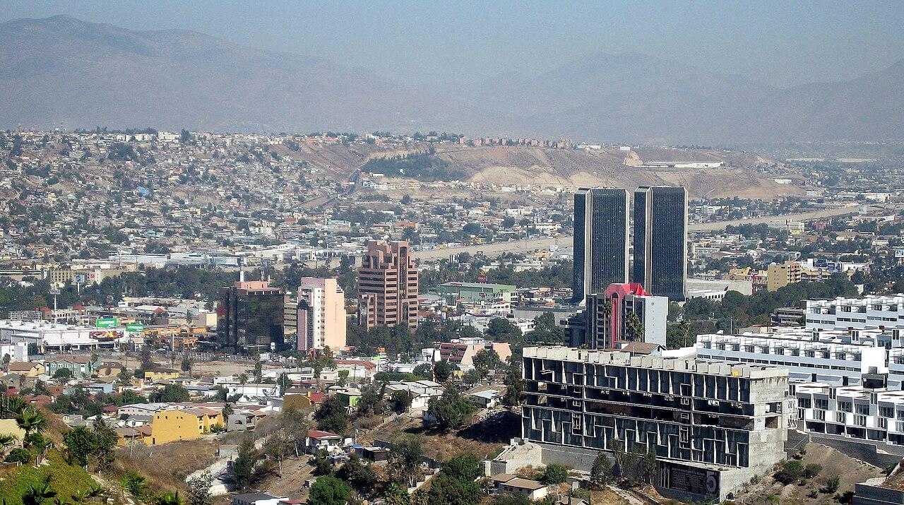 Satellite aerial view of Tijuana International Airport runway and surrounding city